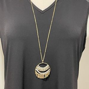 Long goldstone circular necklace- gold tone